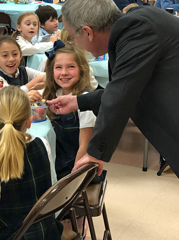 Bishop Luis Rafael Zarama visited St. Egbert School in Morehead City Jan. 29 during Catholic Schools Week. The school and parish are recovering from damaged caused by Hurricane Florence last year.