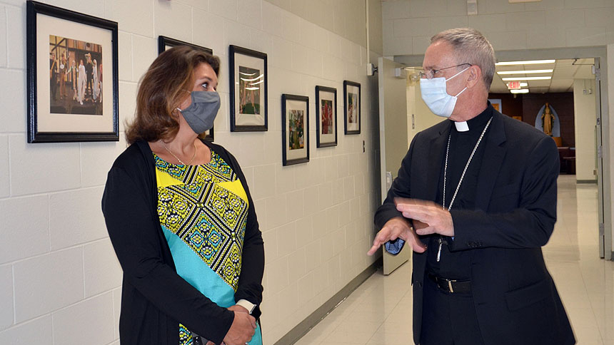 Bishop fields students' questions during Gibbons visit