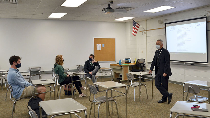 Bishop fields students' questions during Gibbons visit