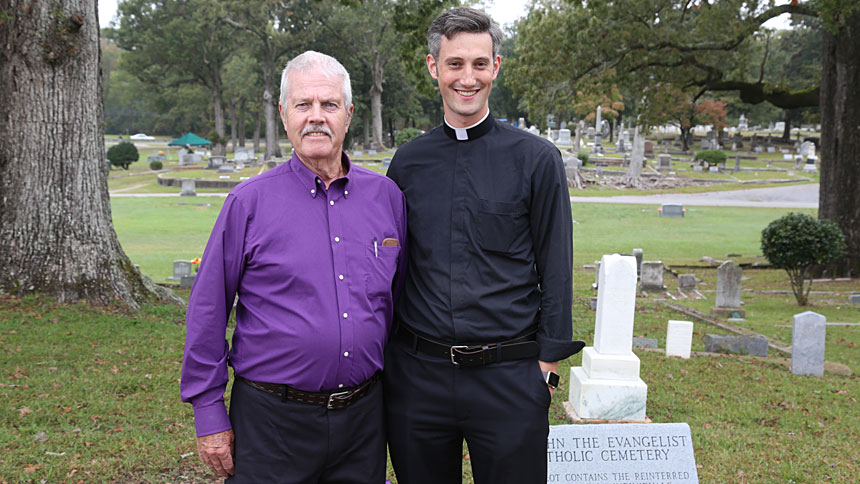 Mother of Mercy parishioner Larry McDaniel and Father Mike Schuetz