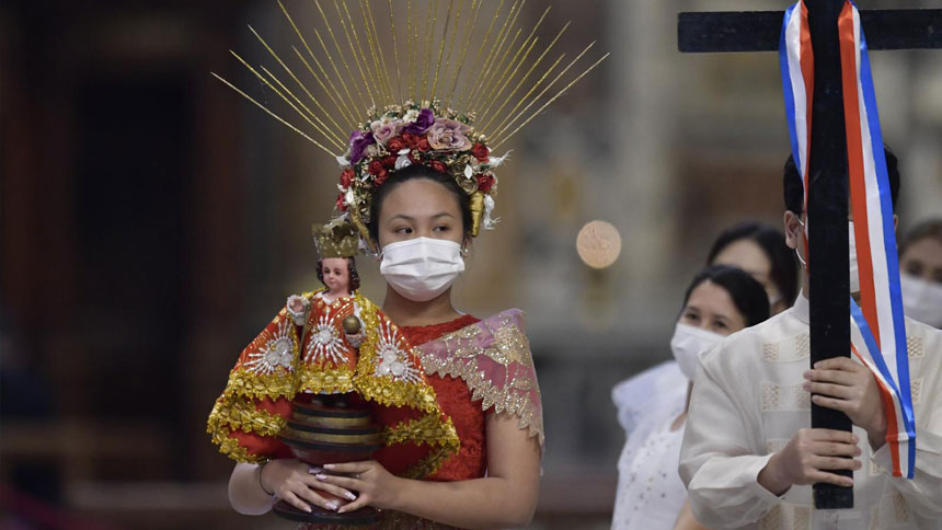 People participate in a procession as Pope Francis celebrates a Mass marking the 500th anniversary of Christianity in the Philippines, in St. Peter's Basilica at the Vatican, March 14, 2021. (CNS photo/Cristian Gennari, pool)