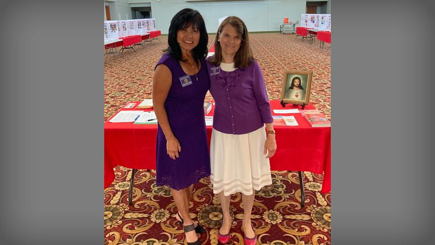 Debbie del Corro El-Chayeb (left) and Patty Schubert (right) smile together at the exhibit in Chapel Hill in June 2023.