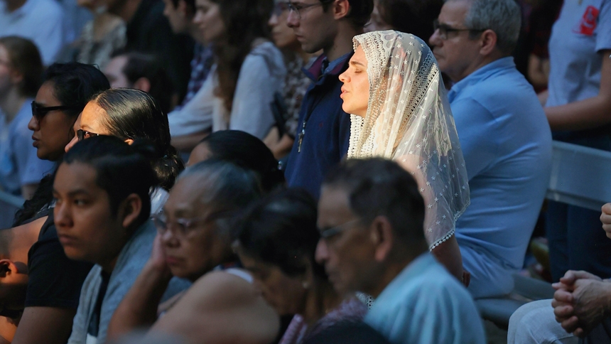 Carrying the Eucharist: St. Michael Parish holds procession at sunset