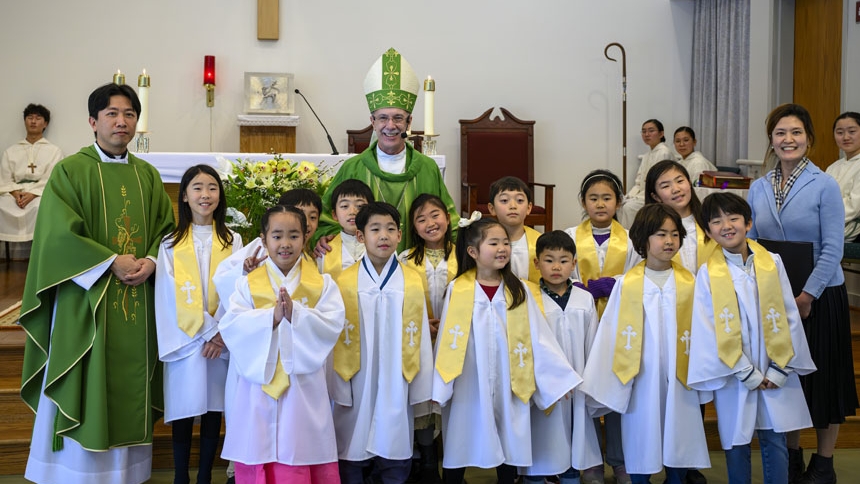 Bishop confirms 26 at St. Ha Sang Paul Jung