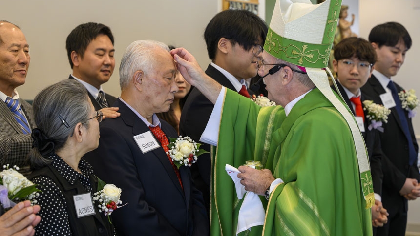 Bishop confirms 26 at St. Ha Sang Paul Jung