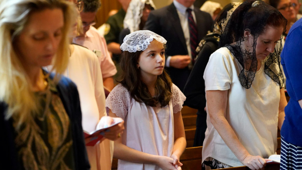 Worshippers attend a traditional Latin Mass July 18, 2021, at St. Josaphat Church in the Queens borough of New York City. The parish, located in the Diocese of Brooklyn, celebrates a traditional Latin Mass on Sundays and five other days of the week. The Sunday liturgy has a dedicated following, drawing more than 150 people from Queens and neighboring counties, in addition to southwestern Connecticut and northern New Jersey. (CNS photo/Gregory A. Shemitz)