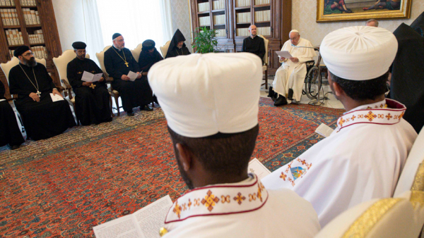 Pope Francis leads an audience with young priests and monks from Oriental Orthodox churches at the Vatican June 3, 2022. In his address the pope said Christians are called to bear witness to Christ together and never "against" one another. (CNS photo/Vatican Media)