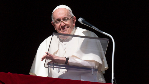 Pope Francis leads the recitation of the Angelus from a window of the Apostolic Palace at the Vatican Nov. 1, 2022, the feast of All Saints. (CNS photo/Vatican Media)